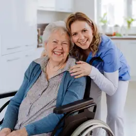 A caregiver helping a senior at home